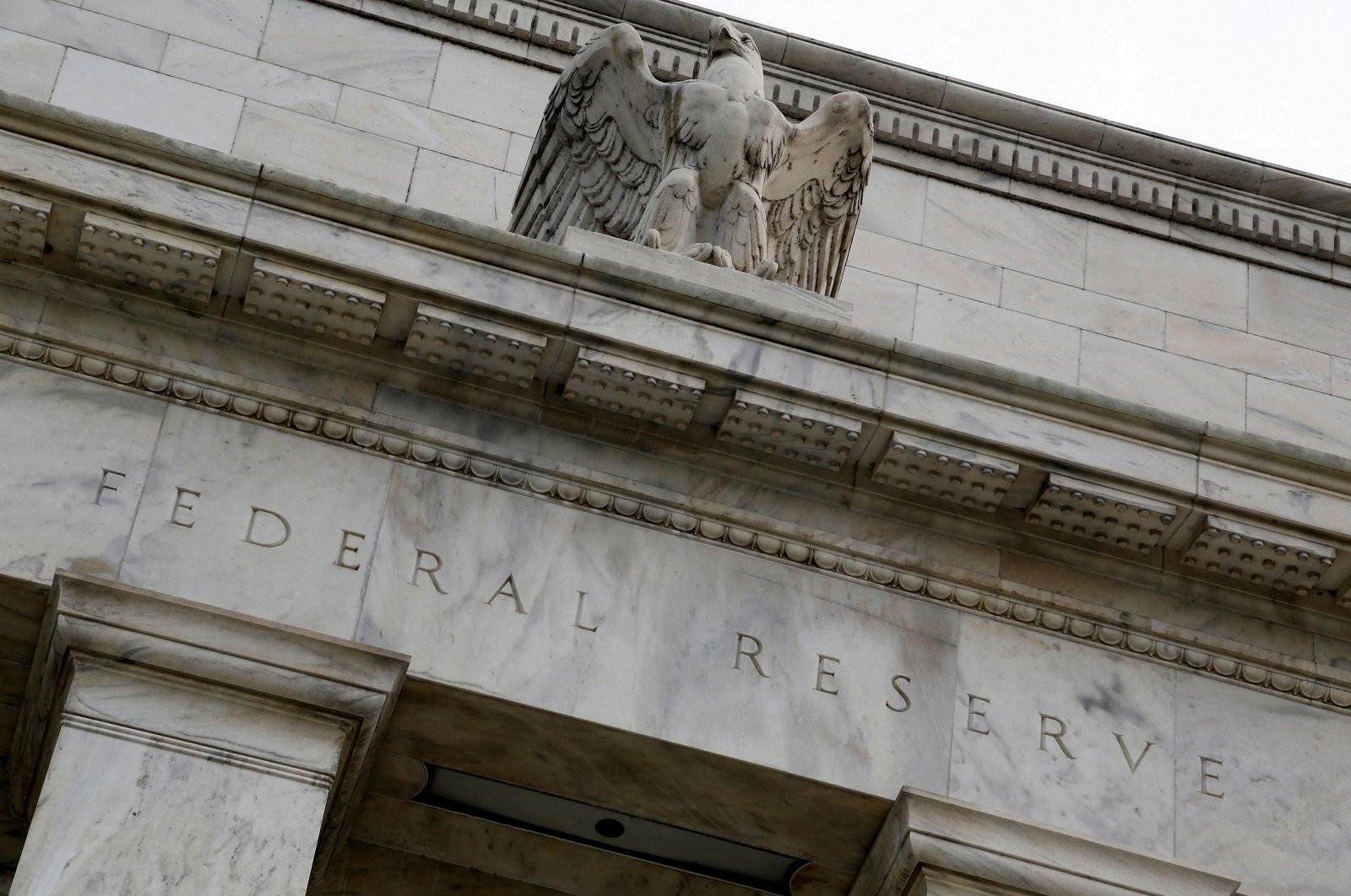 An eagle tops the U.S. Federal Reserve building&#039;s facade in Washington, U.S., July 31, 2013. (Reuters Photo)