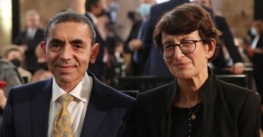 Uğur Şahin (L) and Özlem Türeci attend the award ceremony, in Frankfurt, Germany, March 14, 2022. (AA PHOTO)
