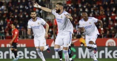 Real Madrid&#039;s Karim Benzema celebrates scoring in a La Liga match against Mallorca, Palma, Spain, March 14, 2022. (Reuters Photo)