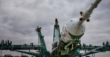 The Soyuz-2.1a rocket booster with the Soyuz MS-21 spacecraft is rolled out onto the launchpad ahead of its upcoming launch to the International Space Station (ISS), at the Baikonur Cosmodrome, Kazakhstan, March 15, 2022. (Roscosmos via Reuters)