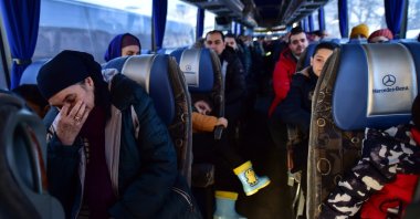 Meskhetian Turks travel to Turkey on a bus from Ukraine, March 14, 2022. (IHA Photo)