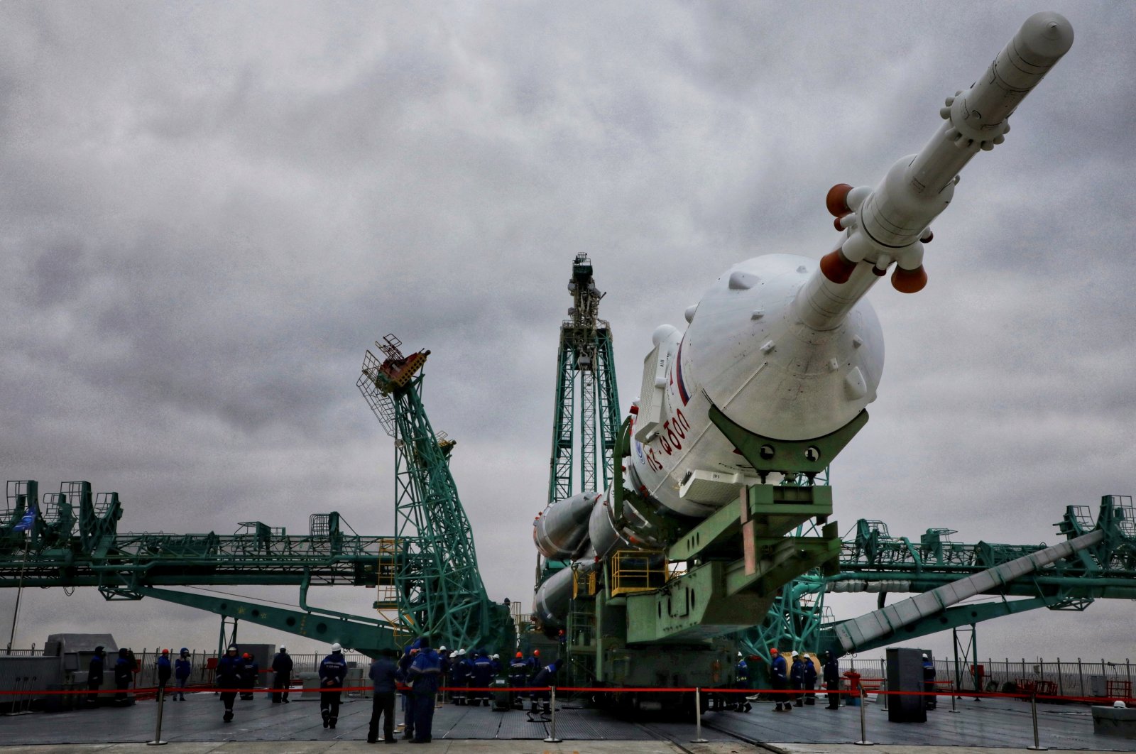 The Soyuz-2.1a rocket booster with the Soyuz MS-21 spacecraft is rolled out onto the launchpad ahead of its upcoming launch to the International Space Station (ISS), at the Baikonur Cosmodrome, Kazakhstan, March 15, 2022. (Roscosmos via Reuters)