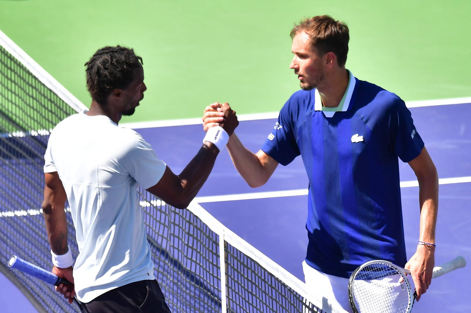 Russia&#039;s Daniil Medvedev congratulates France&#039;s Gael Monfils at the Indian Wells Open, Indian Wells, California, U.S., March 14, 2022. (AFP Photo)