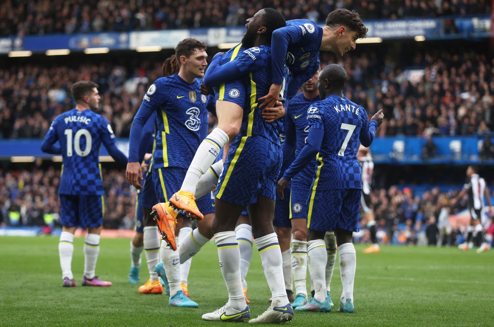 Chelsea players celebrate a goal in a Premier League match against Newcastle, London, England, March 13, 2022. (Reuters Photo)