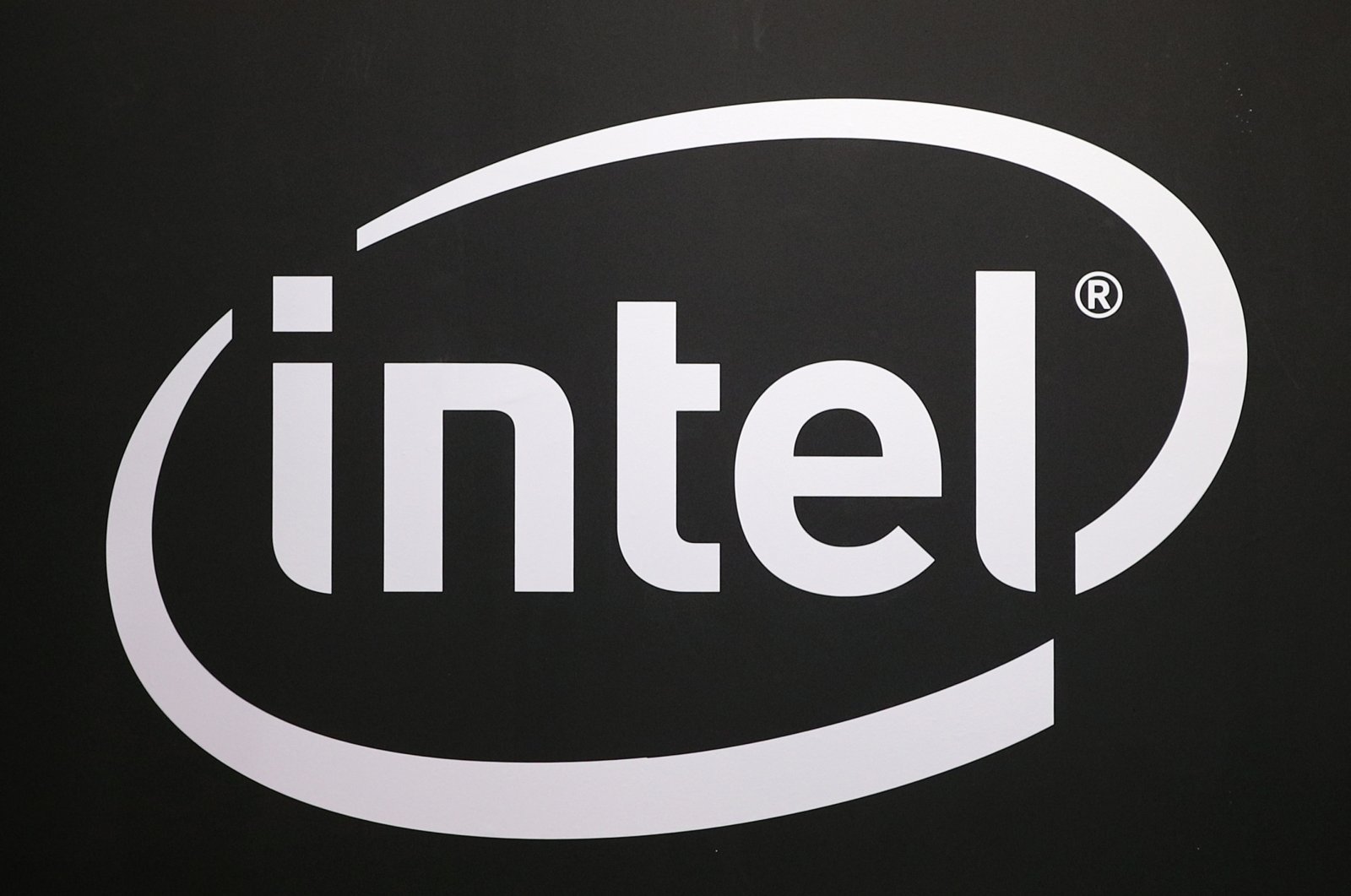 The logo of semiconductor chipmaker Intel is pictured at the Paris games week in Paris, Nov. 4, 2017. (AP Photo)