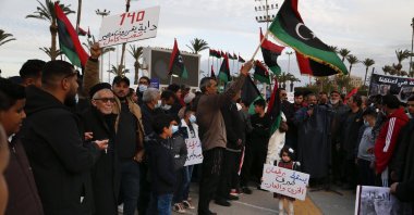 People protest against the naming of Fathi Bashagha as the new interim prime minister, in Tripoli, Libya, Feb. 11, 2022. (AP File Photo)