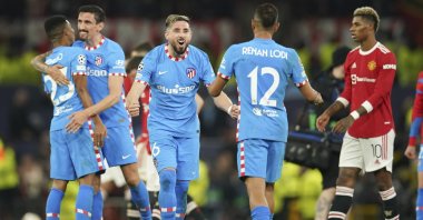 Atletico players celebrate winning their Champions League round of 16, second leg match against Manchester United, Manchester, England, March 15, 2022. (AP Photo)