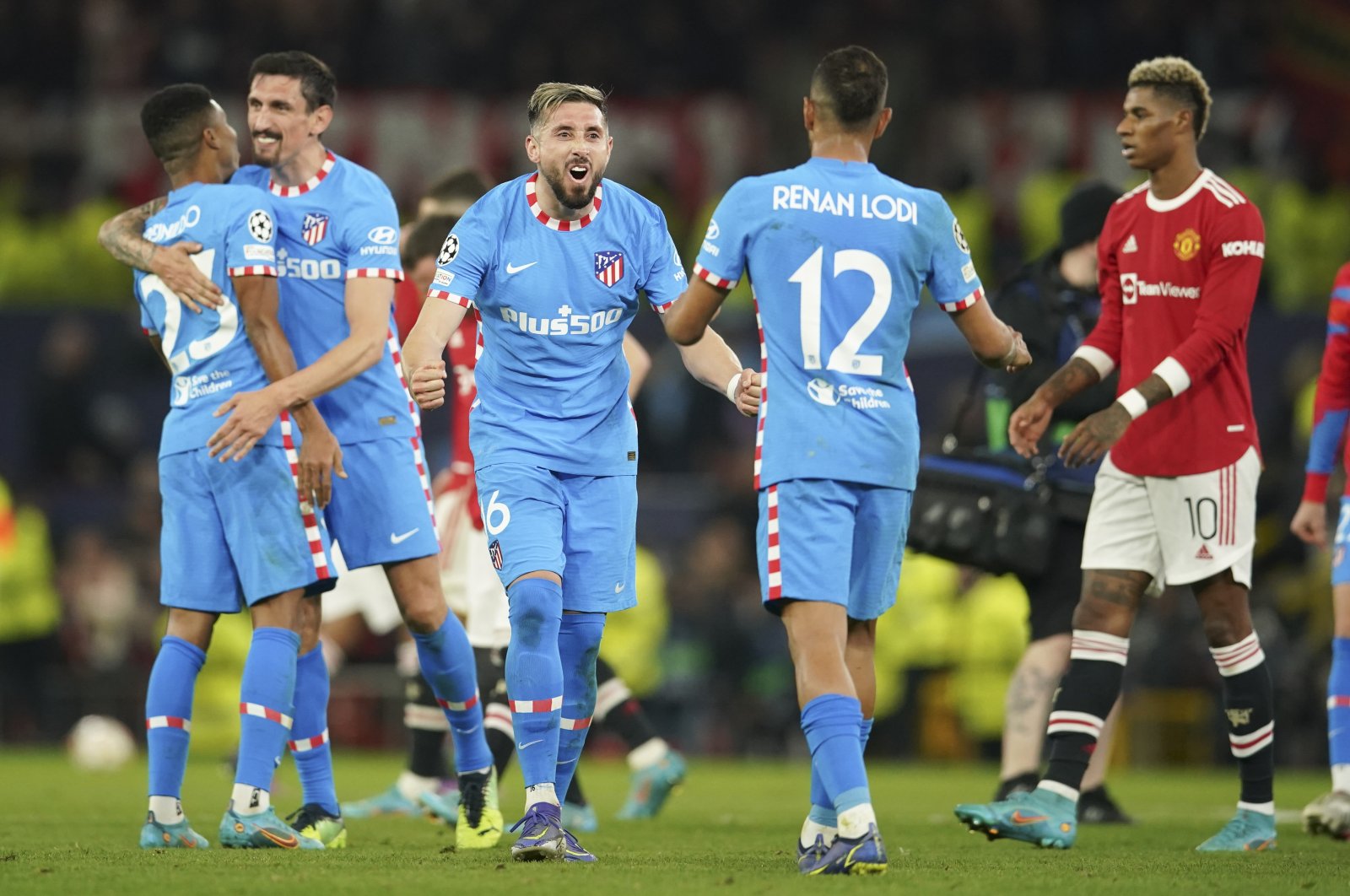 Atletico players celebrate winning their Champions League round of 16, second leg match against Manchester United, Manchester, England, March 15, 2022. (AP Photo)