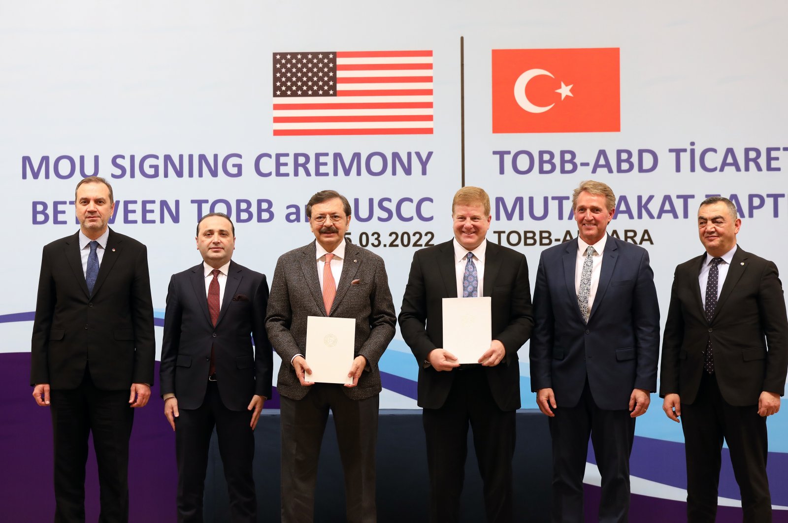 Union of Chambers and Commodity Exchanges of Turkey (TOBB) Chair Rifat Hisarcıklıoğlu (3rd L), Myron Brilliant (3rd R), executive vice president at the U.S. Chamber of Commerce, Jeffrey Flake (2nd R), the U.S. ambassador to Ankara, and Deputy Trade Minister Mustafa Tuzcu (2nd L) during a meeting in Ankara, Turkey, March 16, 2022. (AA Photo)
