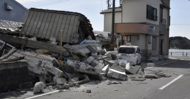 A damaged building is seen following a strong earthquake, in Soma, Fukushima Prefecture, Japan, in this photo taken by Kyodo on March 17, 2022. (Kyodo via Reuters)