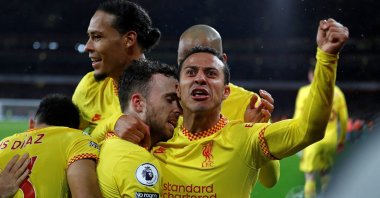 Liverpool&#039;s Diogo Jota (2nd L) celebrates with teammates after scoring in a Premier League game against Arsenal, London, England, March 16, 2022. (AFP Photo)
