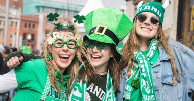 People with green hats celebrate Saint Patrick's Day, in Dublin, Ireland, March 17, 2019. (Shutterstock Photo)