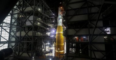 NASA's next-generation moon rocket, the Space Launch System (SLS) rocket with its Orion crew capsule perched on top, is seen in the Vehicle Assembly Building (VAB) at Cape Canaveral, Florida, U.S., March 16, 2022. (Reuters Photo)
