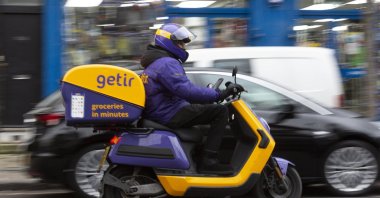 A Getir courier is seen on a street in London, U.K., Dec. 30, 2021. (AA Photo)