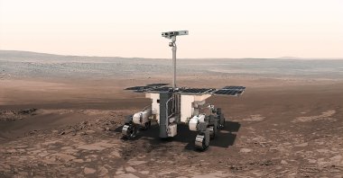 This undated artist rendition provided by the European Space Agency shows the ExoMars robot on Mars. (European Space Agency via AP)