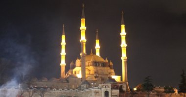 The minarets of Selimiye Mosque are seen illuminated on Berat Night in northwestern Edirne, Turkey, March 17, 2022. (IHA Photo)