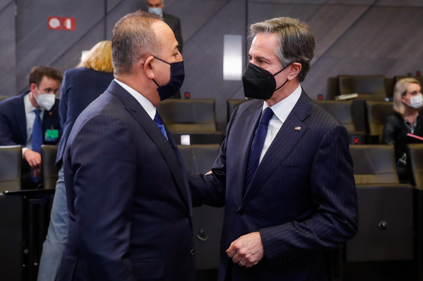 Foreign Minister Mevlüt Çavuşoğlu (L) and U.S. Secretary of State Antony Blinken at the start of an extraordinary meeting of NATO Ministers of Foreign Affairs on the Russian aggression on Ukraine at the NATO headquarters in Brussels, Belgium, March 4, 2022.  (EPA Photo)