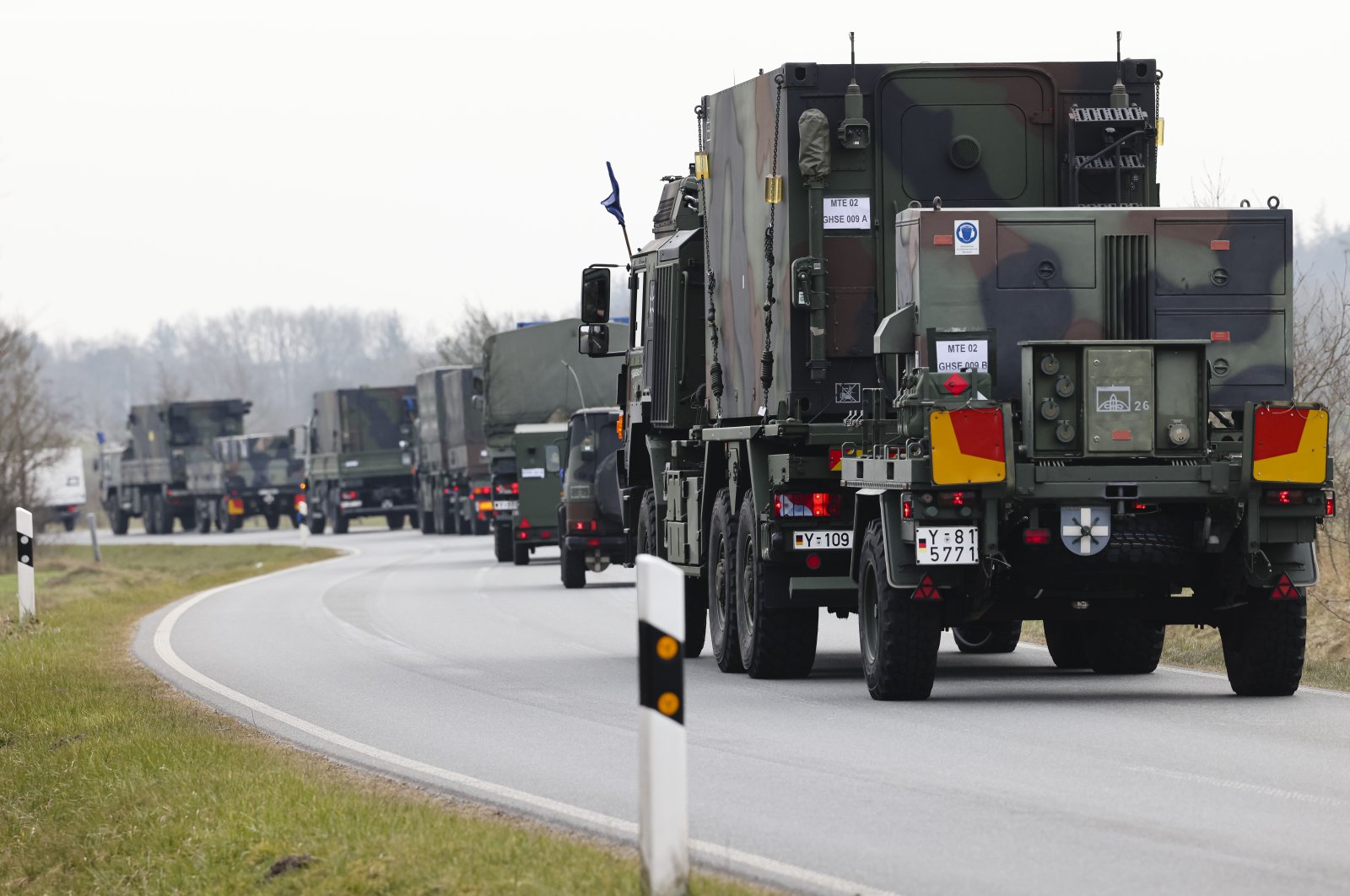 A convoy for the transport of the Patriot air defense missile system leaves the Bundeswehr site of Air Defense Missile Group 26 in Husum, northern Germany, March 16, 2022. (AP Photo)