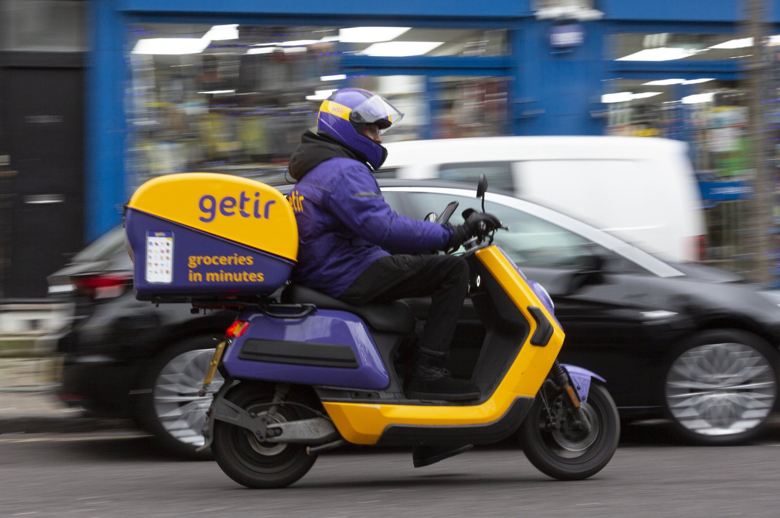 A Getir courier is seen on a street in London, U.K., Dec. 30, 2021. (AA Photo)