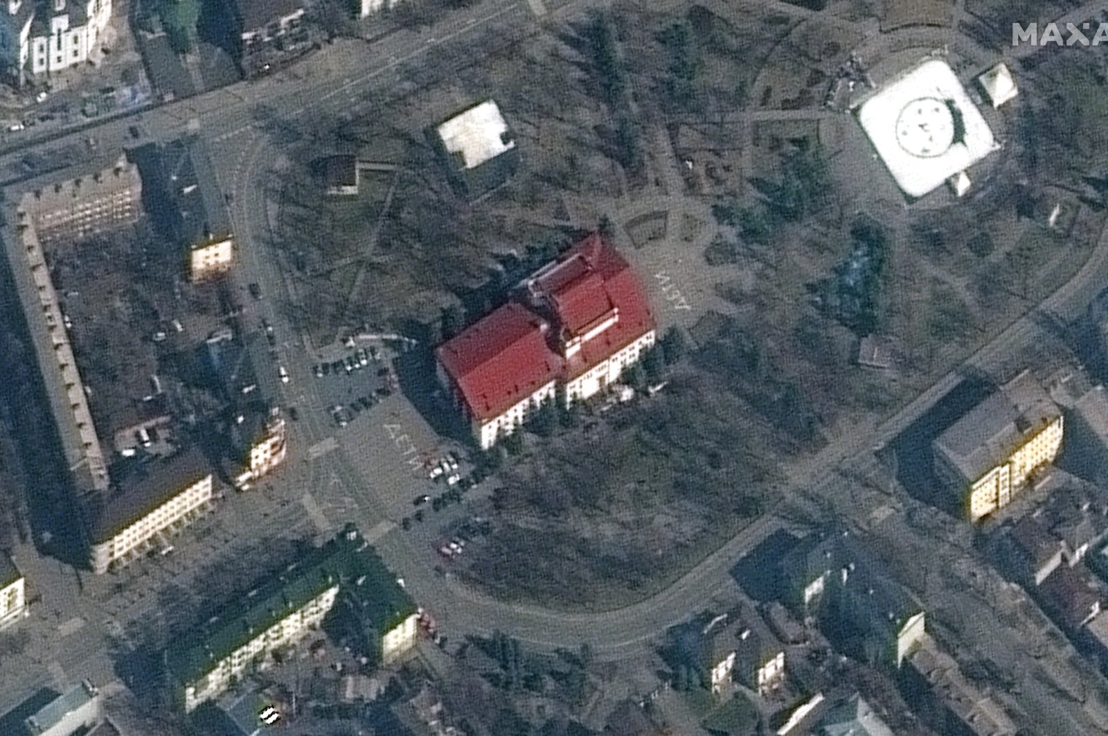 This satellite image provided by Maxar Technologies shows the Mariupol Drama Theater in Mariupol, Ukraine, March 14, 2022. (Maxar Technologies via AP)