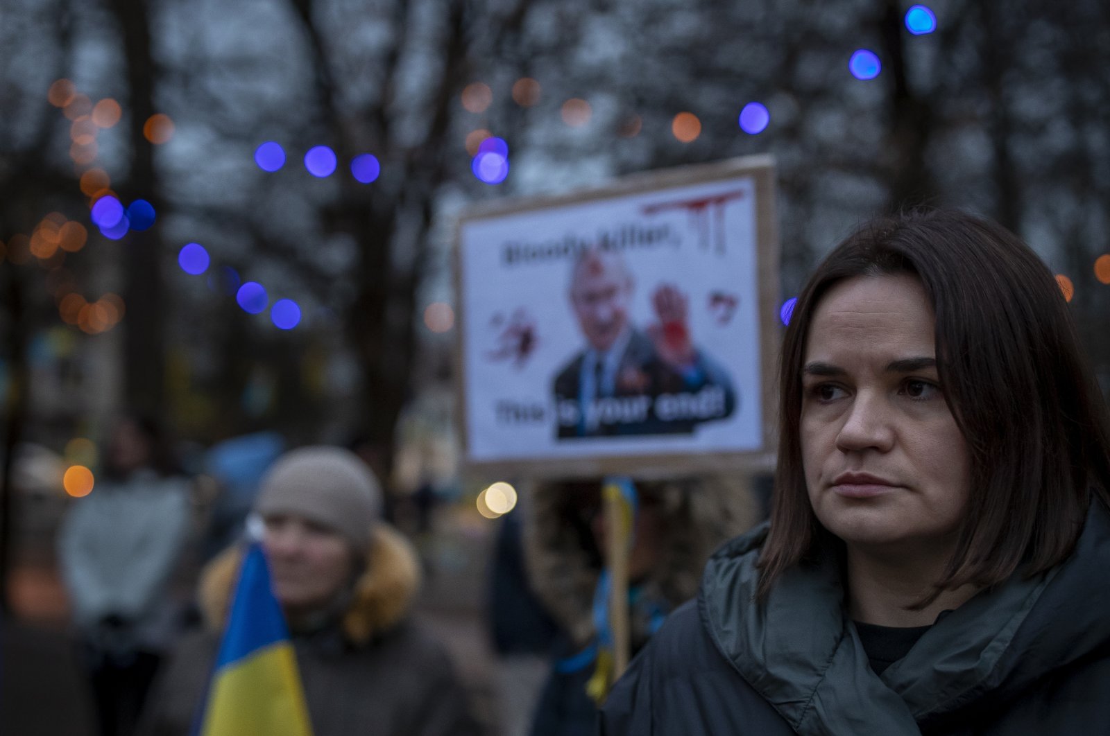 Belarusian opposition leader Sviatlana Tsikhanouskaya, (R), takes part in a protest against the Russian invasion of Ukraine in front of the Russian Embassy in Vilnius, Lithuania, March 4, 2022. (AP Photo)