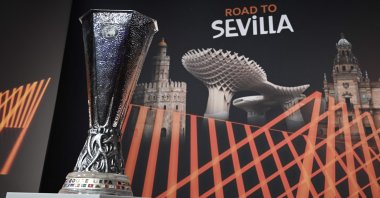The Europa League trophy is displayed ahead of the 2022 quarterfinals, semifinals and final draw, Nyon, Switzerland, March 18, 2022. (AFP Photo)