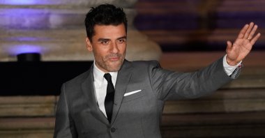 U.S. actor Oscar Isaac poses on arrival to attend the Special Screening of Marvel Studios' "Moon Knight" at the British Museum, in London, U.K., March 17, 2022. (AFP Photo)