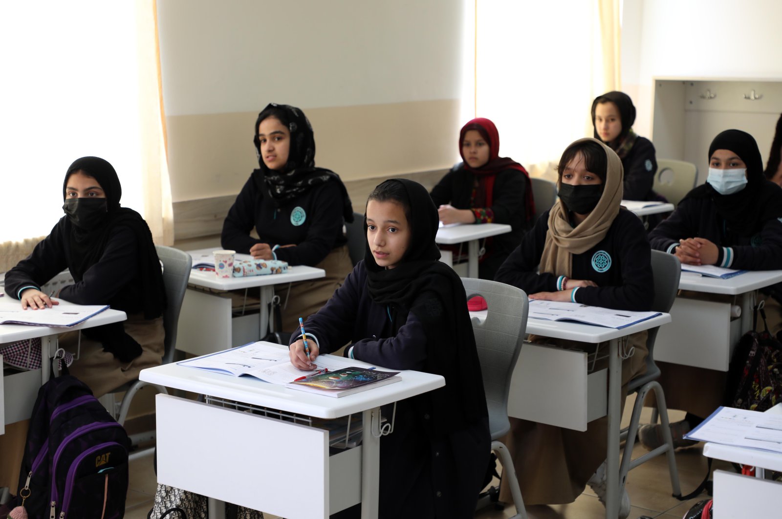 Female students attend a class at a Maarif school in Herat, Afghanistan, March 17, 2022. (AA PHOTO)