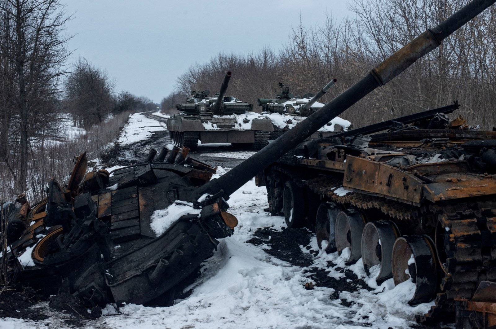 A charred Russian tank and captured tanks are seen amid Russia&#039;s invasion of Ukraine, in the Sumy region, Ukraine, March 7, 2022. (Reuters Photo)