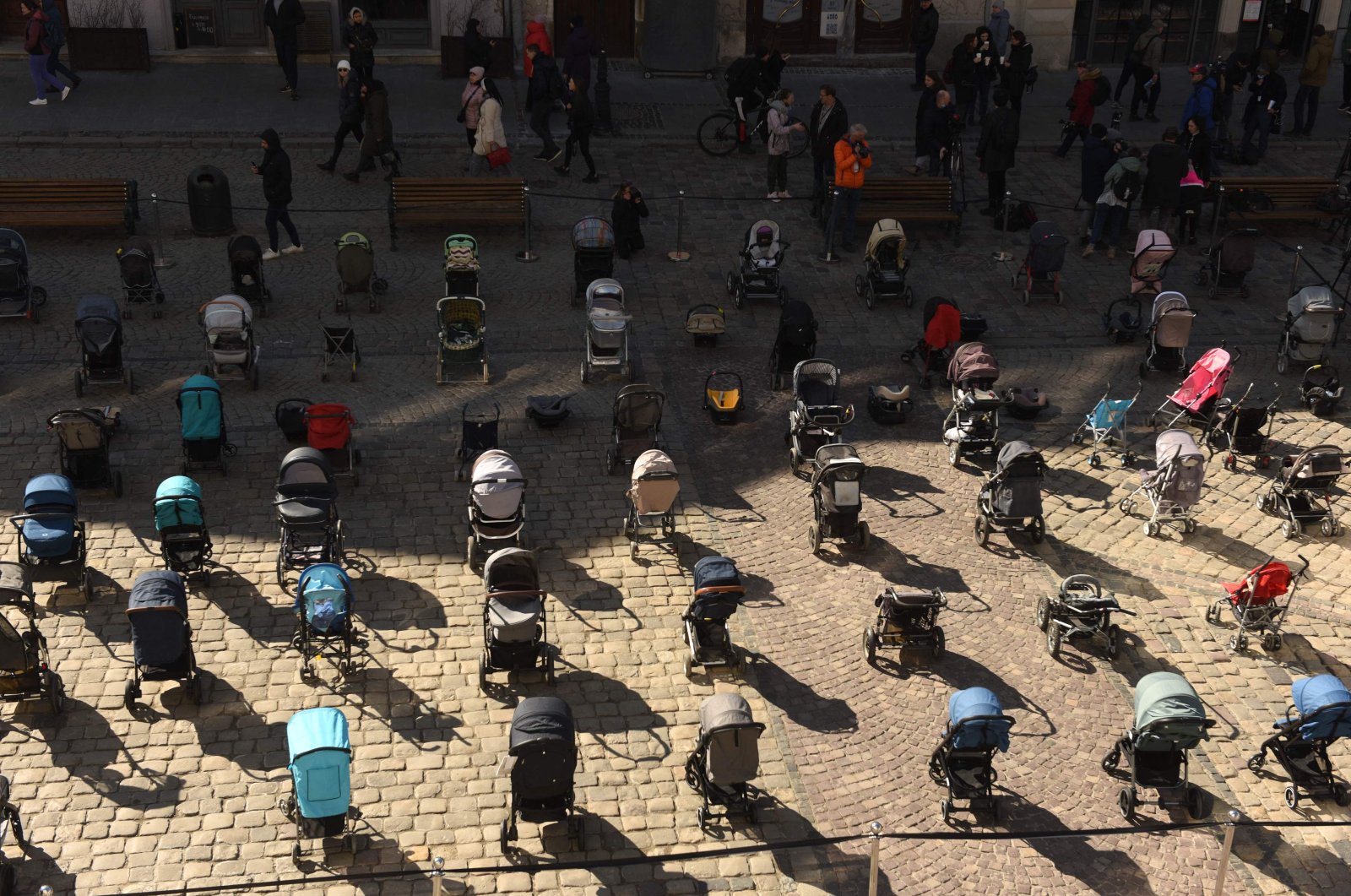 Exactly 109 empty strollers were placed outside the Lviv city council to remember the number of children killed in Russia&#039;s ongoing invasion of Ukraine, Lviv, Ukraine, March 18, 2022, (AFP Photo)
