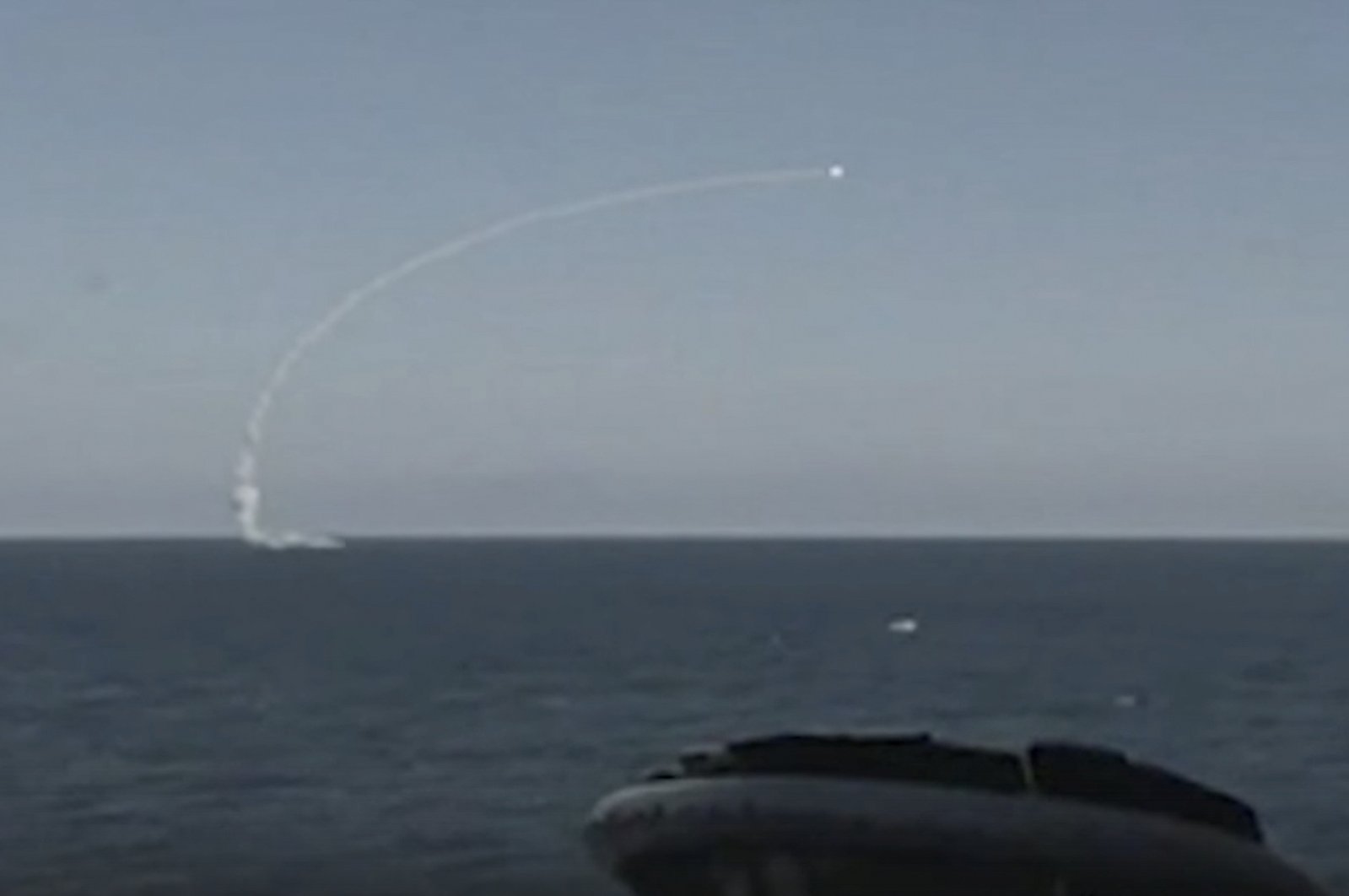 A handout still image taken from handout video made available by the Russian Defence Ministry press-service shows a Russian navy ship launching a &quot;Kalibr/Klub&quot; cruise missile in exercises that also launched the &quot;Zirkon&quot; hypersonic missiles during the Russian strategic deterrence forces exercises in Russia, Feb. 19, 2022. (EPA Photo)