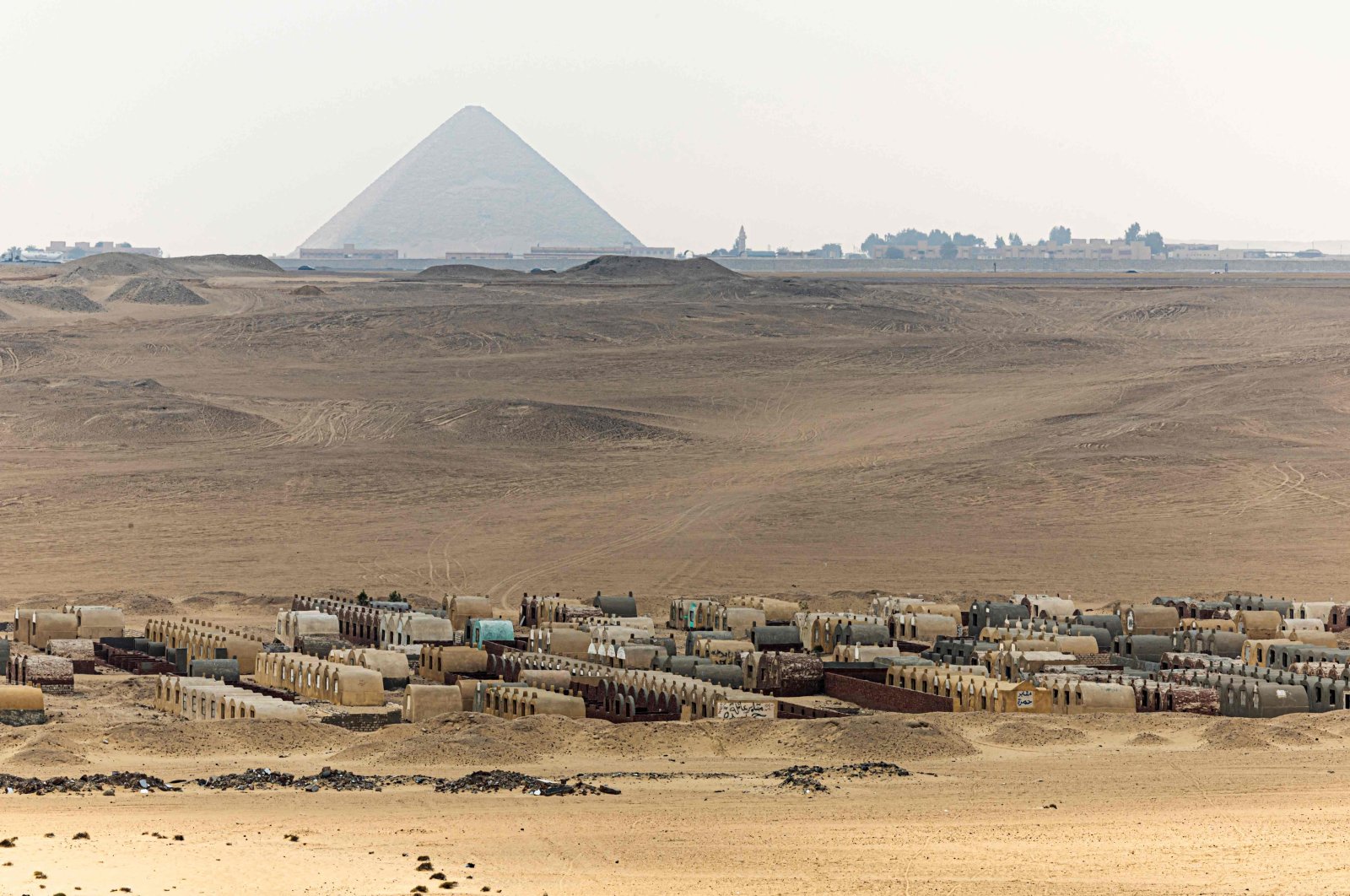 This picture shows the cemetary of the Saqqara village on March 19, 2022, near the site where five ancient Pharaonic tombs, were recently discovered at the Saqqara archaeological site, south of the Egyptian capital Cairo. (AFP Photo)