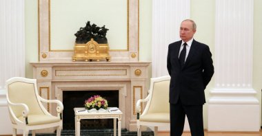 Russian President Vladimir Putin stands in a hall prior to a meeting at the Kremlin in Moscow, Russia, March 11, 2022. (AFP Photo)