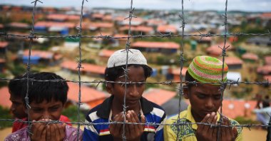 Rohingya refugees perform prayers as they remember a military crackdown that prompted a massive exodus of people from Myanmar to Bangladesh, at the Kutupalong refugee camp in Ukhia, Cox&#039;s Bazar, Bangladesh, Aug. 25, 2018. (AFP Photo)