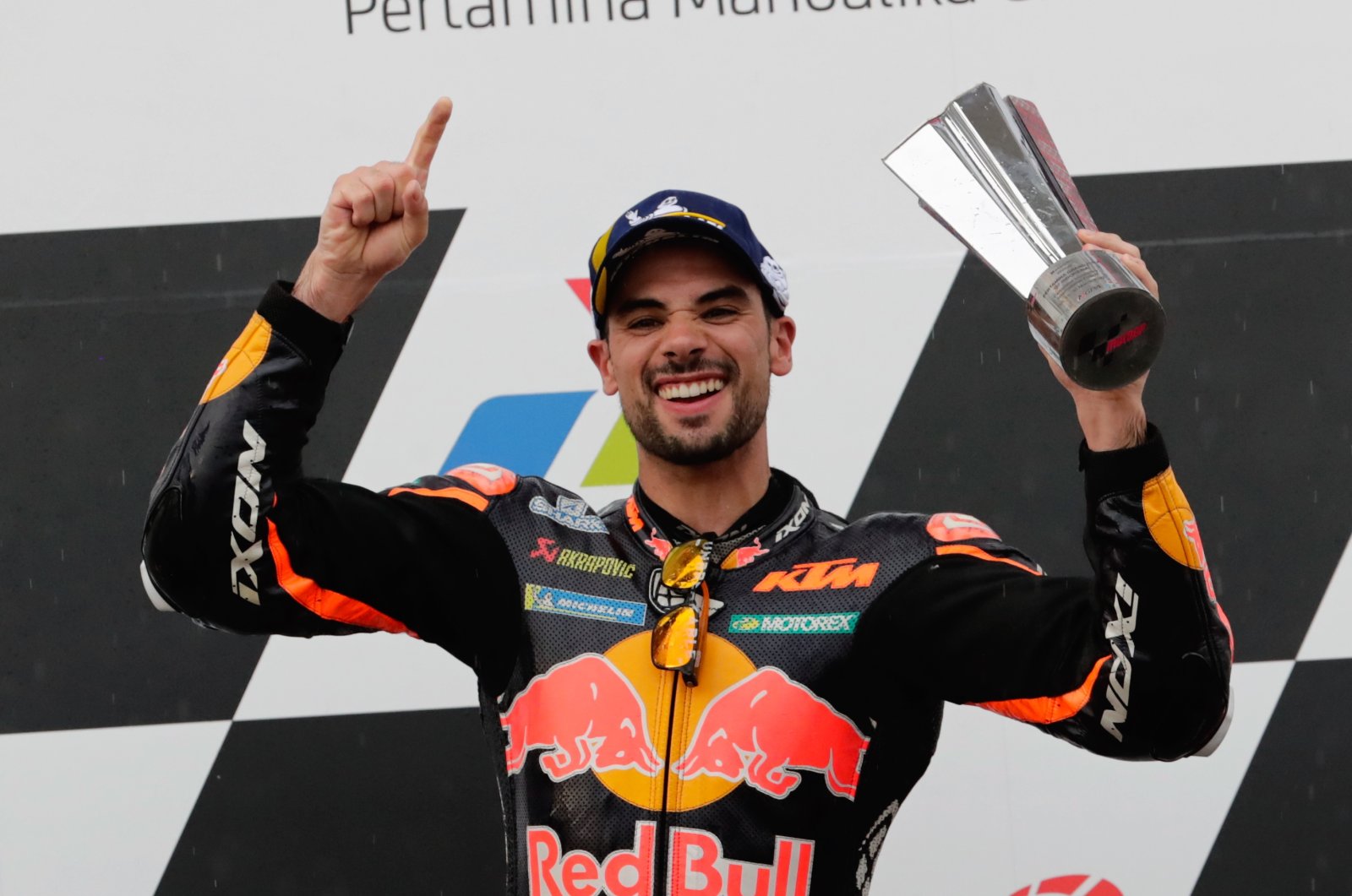Red Bull KTM&#039;s Miguel Oliveira celebrates winning the Indonesian MotoGP, Lombok, Indonesia, March 20, 2022. (EPA Photo)