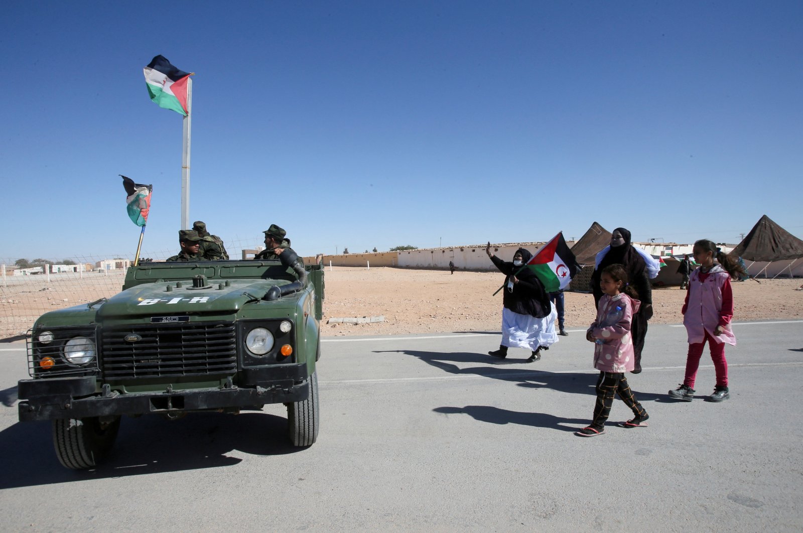 People greet Sahrawi soldiers during the visit of the U.N. envoy to Western Sahara, Jan. 15, 2022. (Reuters Photo)