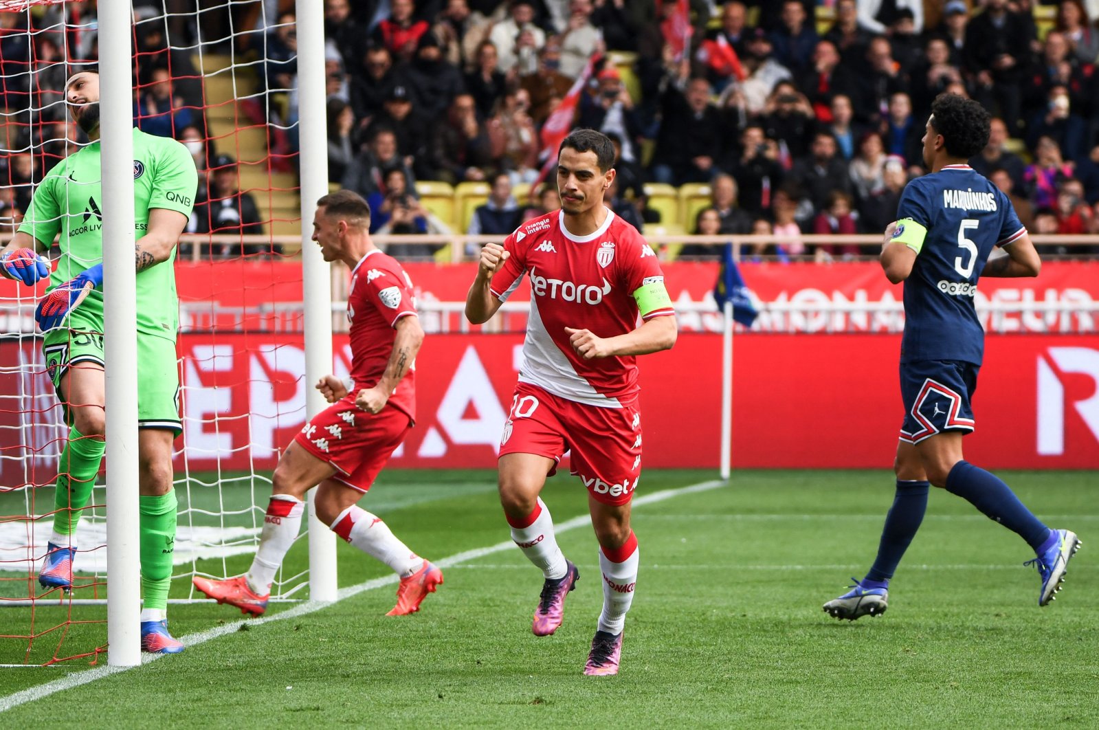Monaco&#039;s French forward Wissam Ben Yedder (C) celebrates after scoring a penalty during a French L1 match against PSG, Monaco, March 20, 2022. (AFP Photo)
