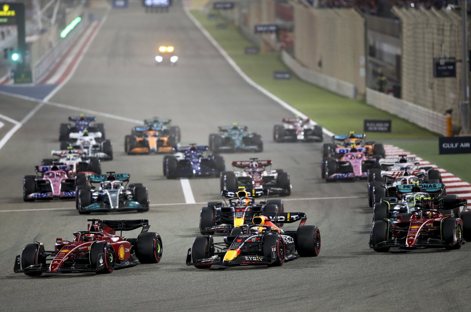 Monaco&#039;s Formula One driver Charles Leclerc (Front L) of Scuderia Ferrari leads the pack at the start of the Formula One Grand Prix of Bahrain at the Bahrain International Circuit in Sakhir, Bahrain, March 20, 2022. (EPA Photo)
