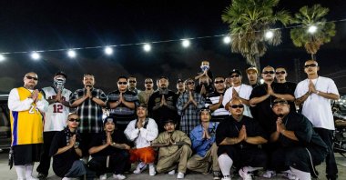Members of the &quot;Barbarian Has a Gun 13&quot; group pose during a weekly meet-up at the Owl Night Market in Bangkok, Thailand, Feb. 18, 2022. (AFP Photo)