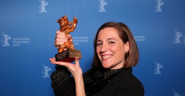 In this file photo taken on February 16, 2022 Spanish director and screenwriter Carla Simon poses during a photo call after being awarded the Golden Bear for Best Film award for the film "Alcarras" after the awards ceremony of the 72nd Berlinale Film Festival in Berlin. (AFP)
