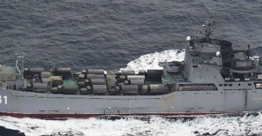 A Russian Navy Alligator-class landing vessel sails through the Tsugaru Strait between Japan&#039;s Honshu and Hokkaido islands, March 16, 2022 . (Photo by Handout / DEFENSE MINISTRY OF JAPAN VIA JIJI PRESS / AFP)