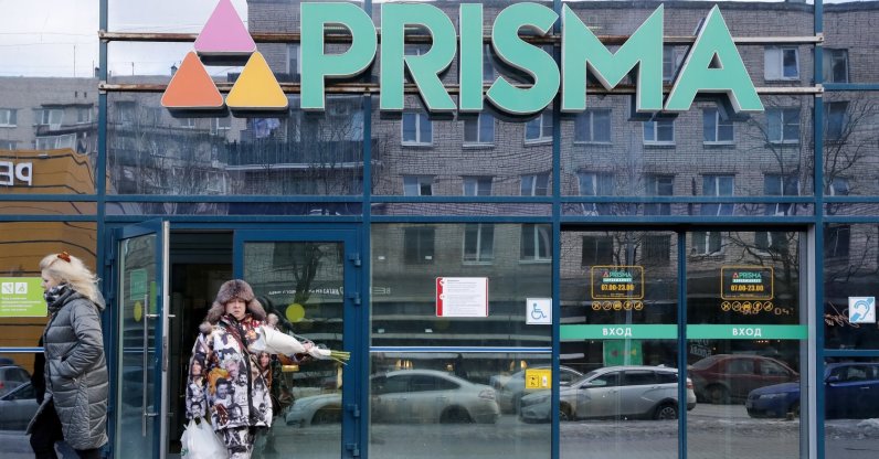 A Russian woman leaves after buying groceries at a PRISMA supermarket before the store closes in St. Petersburg, Russia, March 4, 2022. (EPA Photo)