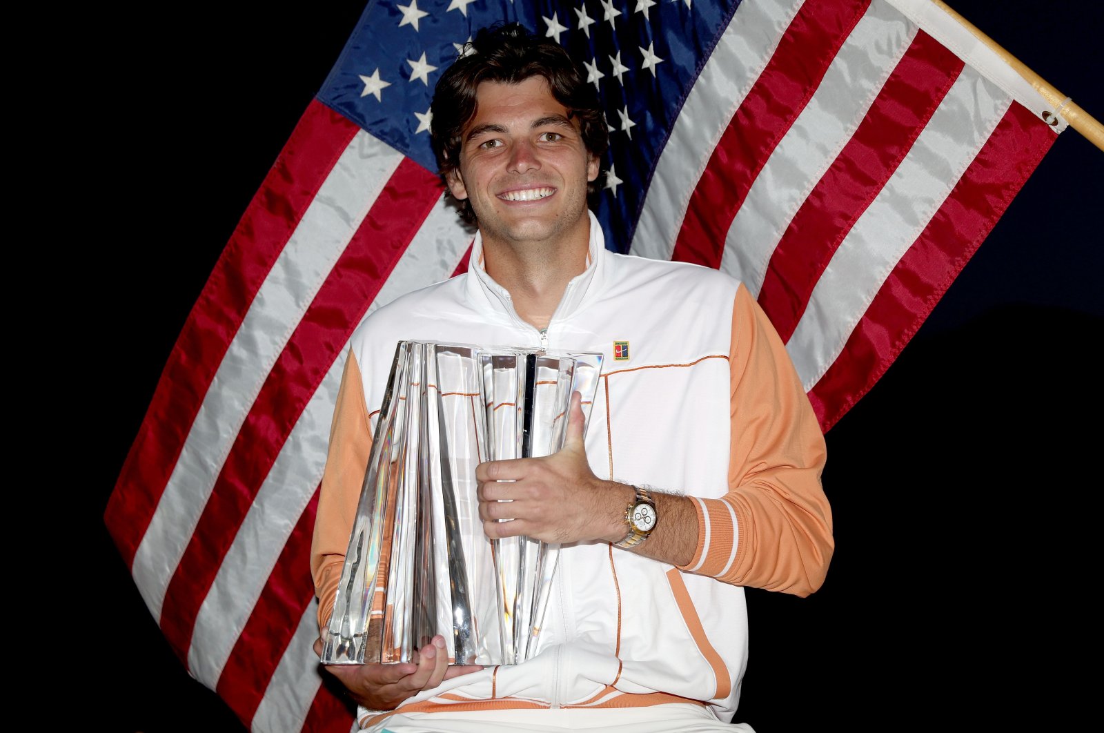 U.S.&#039; Taylor Fritz poses with the trophy after winning the Indian Wells Open, Indian Wells, California, U.S., March 20, 2022. (Reuters Photo)