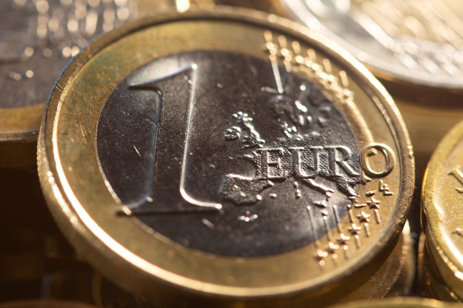 One euro coins are seen in this illustration taken on Nov. 9, 2021. (Reuters Photo)