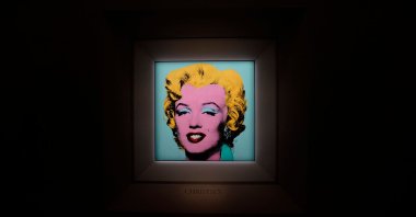 Andy Warhol’s 1964 "Shot Sage Blue Marilyn" displayed during a press preview,  New York, U.S., March 21, 2022. (AFP)