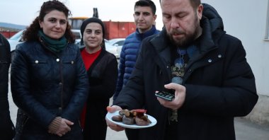Kilis born Turkish chef Yunus Emre Akkor (R) and other experts taste local food in Kilis, Turkey, March 22, 2022. (AA Photo)