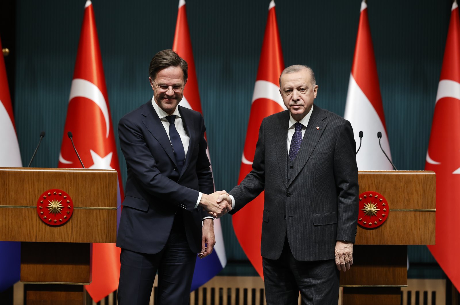 President Recep Tayyip Erdoğan (R) and Dutch Prime Minister Mark Rutte shake hands at a joint press conference after their meeting in the capital Ankara, Turkey, March 22, 2022. (AA Photo)