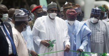 Nigerian President Muhammadu Buhari (C) during the commissioning of Dangote fertilizer plant in Lagos, Nigeria, March 22, 2022. (AP Photo)