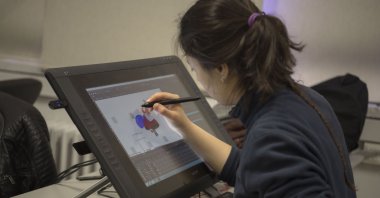 A student from Anadolu University working on her drawings, Eskişehir, Turkey, March 23, 2022. (IHA Photo)