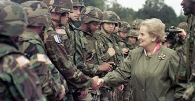 U.S. Secretary of State Madeleine Albright shakes hands with U..S soldiers during her visit to Air Base Eagle near Tuzla, Bosnia-Herzegovina, Aug. 30, 1998. (AP Photo)